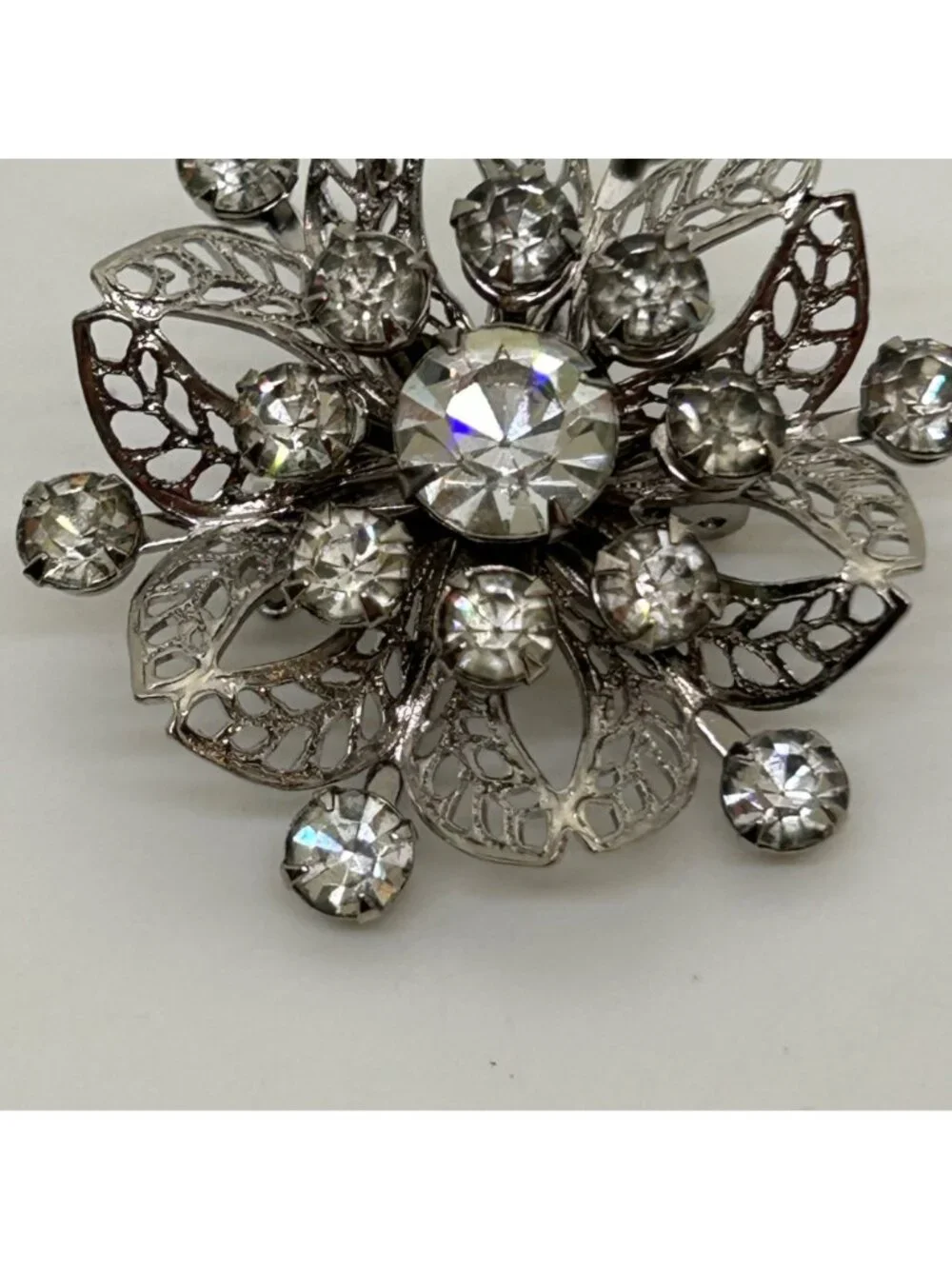 Vintage Silver Tone Rhinestone Brooch Pin Clear Crystal Floral Filigree Mid Cent